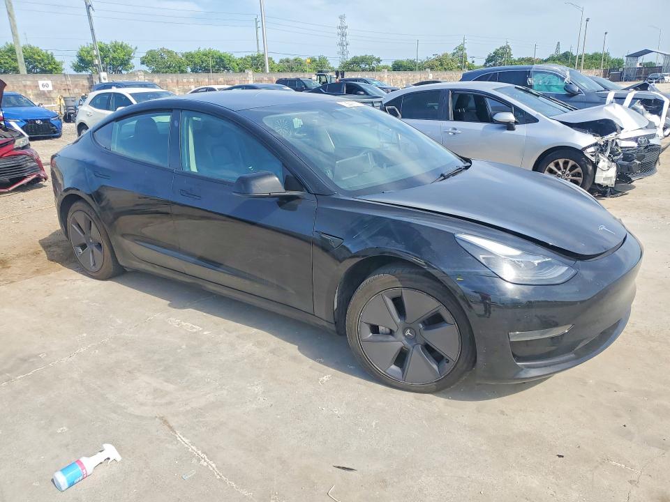 2023 Tesla Model 3 VIN 5YJ3E1EA0PF456887 COPART salvage auction — FRONT END, FL - CERTIFICATE OF TITLE, sold $4,650 on 2026-07-27 (photo 4)
