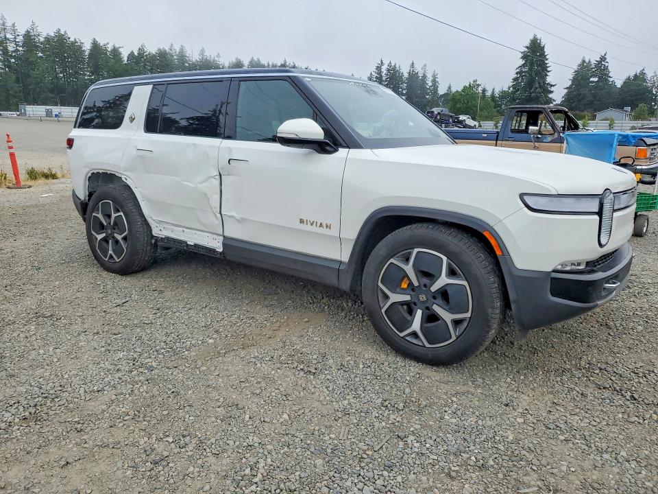 2023 Rivian R1s VIN 7PDSGABA4PN014196 COPART salvage auction — SIDE, Wa - Bill Of Sale, sold $26,500 on 2026-08-21 (photo 4)