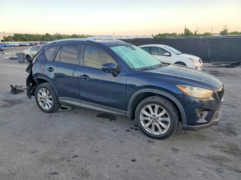 2015 Mazda Cx-5 VIN JM3KE2DY8F0528150 COPART salvage auction — REAR END, Fl - Cert Of Title Slvg Rebuildable, sold $50 on 2026-07-21 (photo 4)