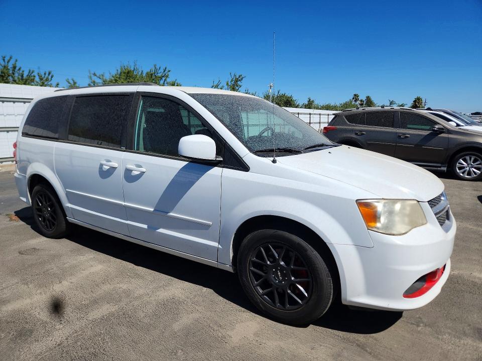 2014 Dodge Caravan VIN 2C4RDGCG5ER344885 COPART salvage auction — MINOR DENT/SCRATCHES, Ca - Dis/Dlr/Exp Only Clean Title, sold $725 on 2026-09-21 (photo 4)