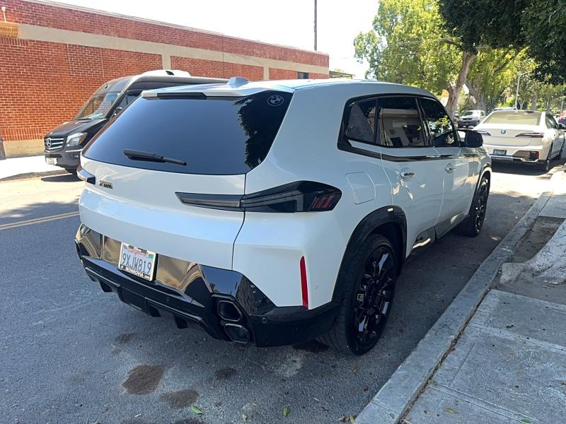 2024 BMW Xm VIN 5YM23CS02R9U56161 COPART salvage auction — NORMAL WEAR, Ca - Dis/Dlr/Exp Only Clean Title (P), sold $49,500 on 2026-07-27 (photo 4)