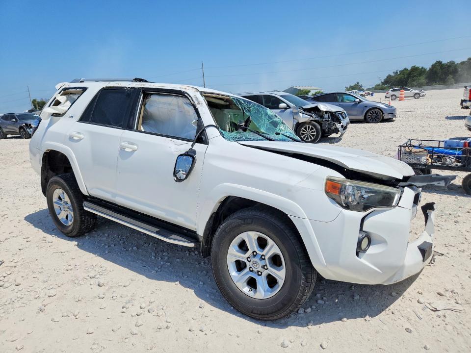 2015 Toyota 4runner VIN JTEBU5JR6F5275631 COPART salvage auction — ROLLOVER, TX - SALVAGE VEHICLE TITLE (P), sold $2,100 on 2026-07-30 (photo 4)