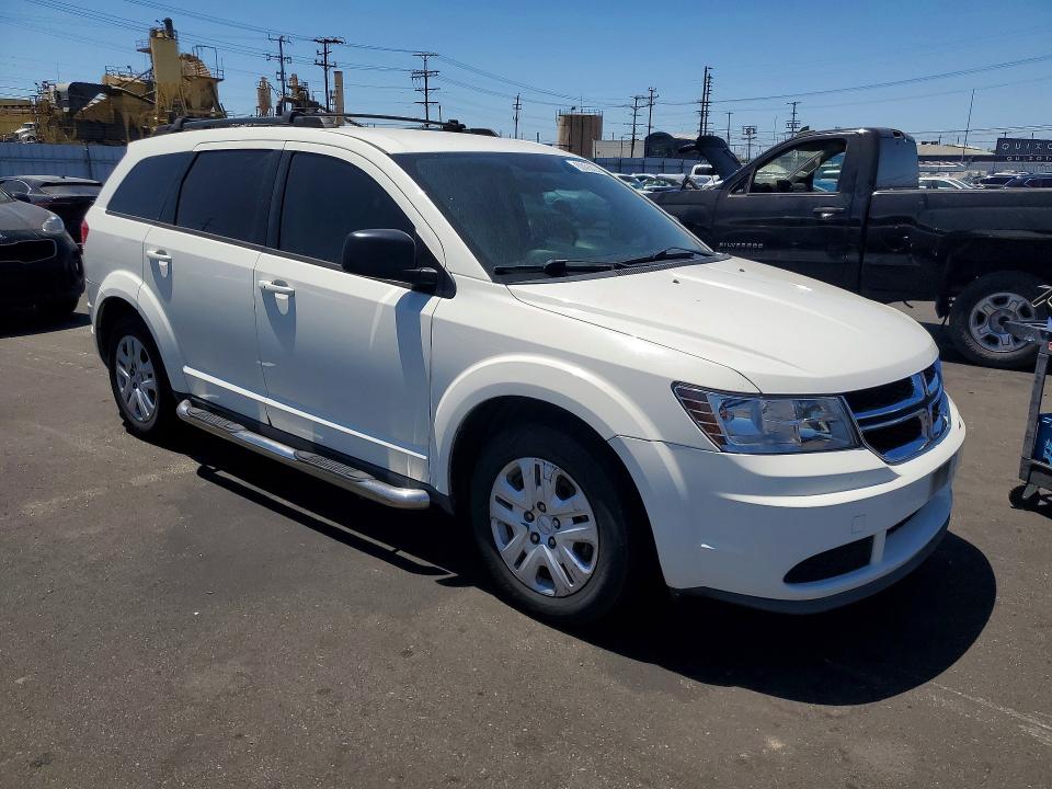 2014 Dodge Journey VIN 3C4PDCAB0ET102624 COPART salvage auction — MINOR DENT/SCRATCHES, Ca - Dis/Dlr/Exp Only Clean Title, sold $325 on 2026-07-22 (photo 4)