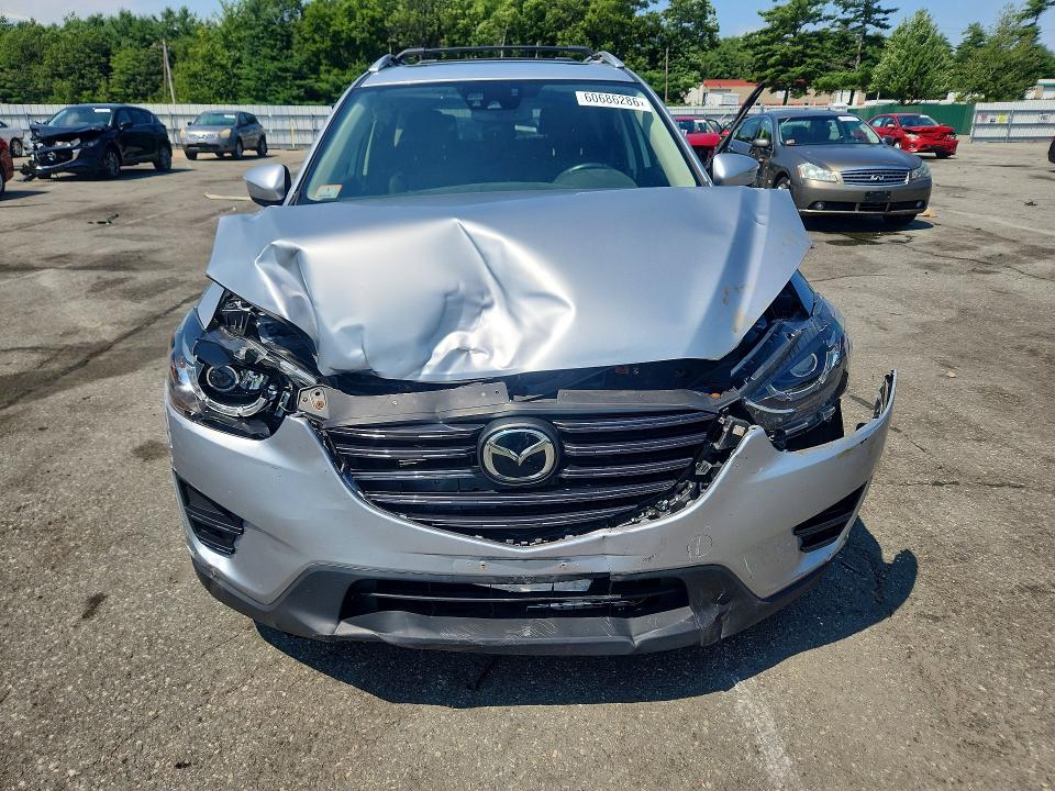 2016 Mazda Cx-5 VIN JM3KE4DY1G0845703 COPART salvage auction — FRONT END, MA - CERT OF TITLE-RECONSTRCTD COLL, sold $3,350 on 2026-07-14 (photo 5)