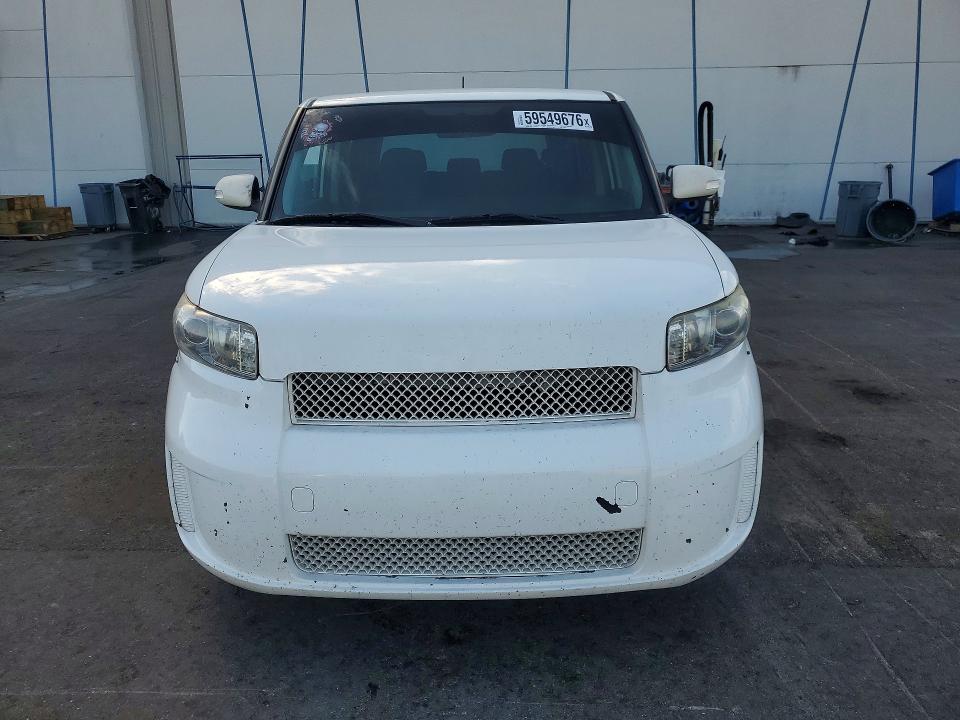 2011 Toyota Scion VIN JTLZE4FE7B1120060 COPART salvage auction — SIDE, Fl - Cert Of Title Slvg Rebuildable, sold $425 on 2026-07-25 (photo 5)