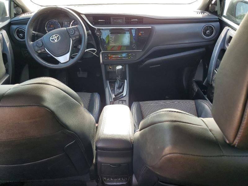 2017 Toyota Corolla VIN 5YFBURHE8HP616757 COPART salvage auction — SIDE, Fl - Cert Of Title Slvg Rebuildable, sold $2,100 on 2026-07-28 (photo 8)