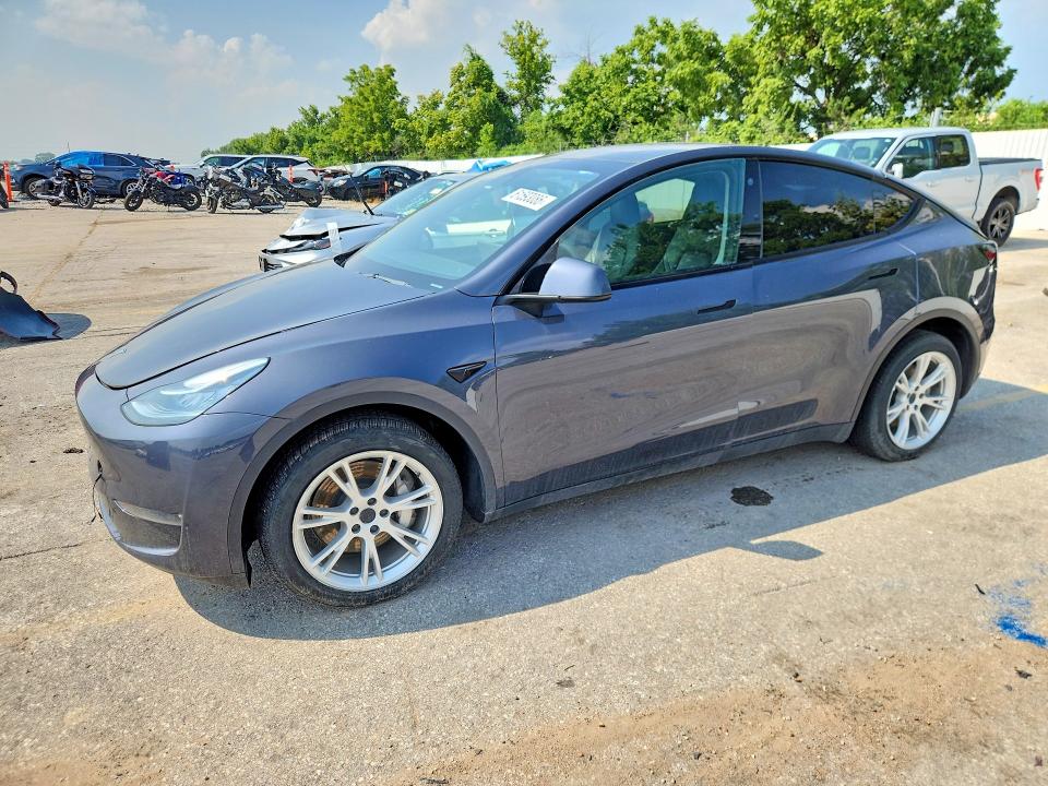 2023 Tesla Model y VIN 7SAYGDEF5PA049323 COPART salvage auction — NORMAL WEAR, MO - CERTIFICATE OF TITLE, sold $9,000 on 2026-07-28 (photo 1)