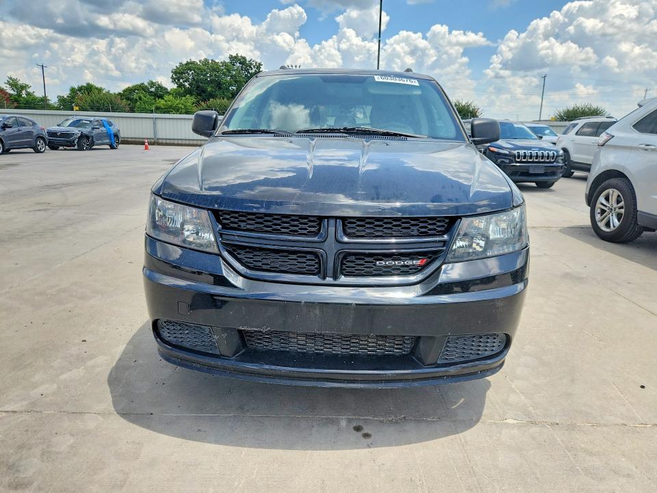2017 Dodge Journey VIN 3C4PDCABXHT706895 COPART salvage auction — MINOR DENT/SCRATCHES, TX - CERTIFICATE OF TITLE, sold $975 on 2026-08-02 (photo 5)