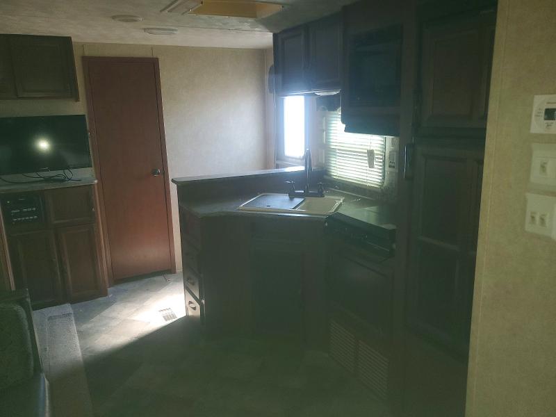 2014 Forest riv Recreational vehicle (rv) VIN 4X4TPUF23EP049890 COPART salvage auction — HAIL, IA - CERTIFICATE OF TITLE, sold $4,700 on 2026-08-11 (photo 7)