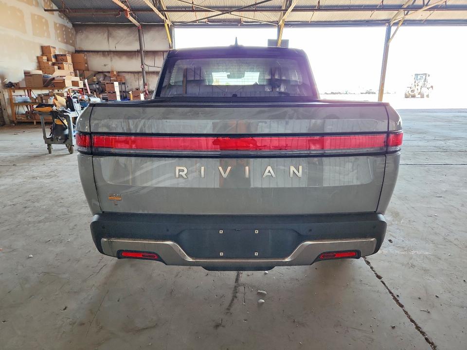 2024 Rivian R1t VIN 7FCTGAAA6RN032337 COPART salvage auction — BURN, AZ - CERT OF TITLE - SALVAGE, sold $28,750 on 2026-10-12 (photo 6)