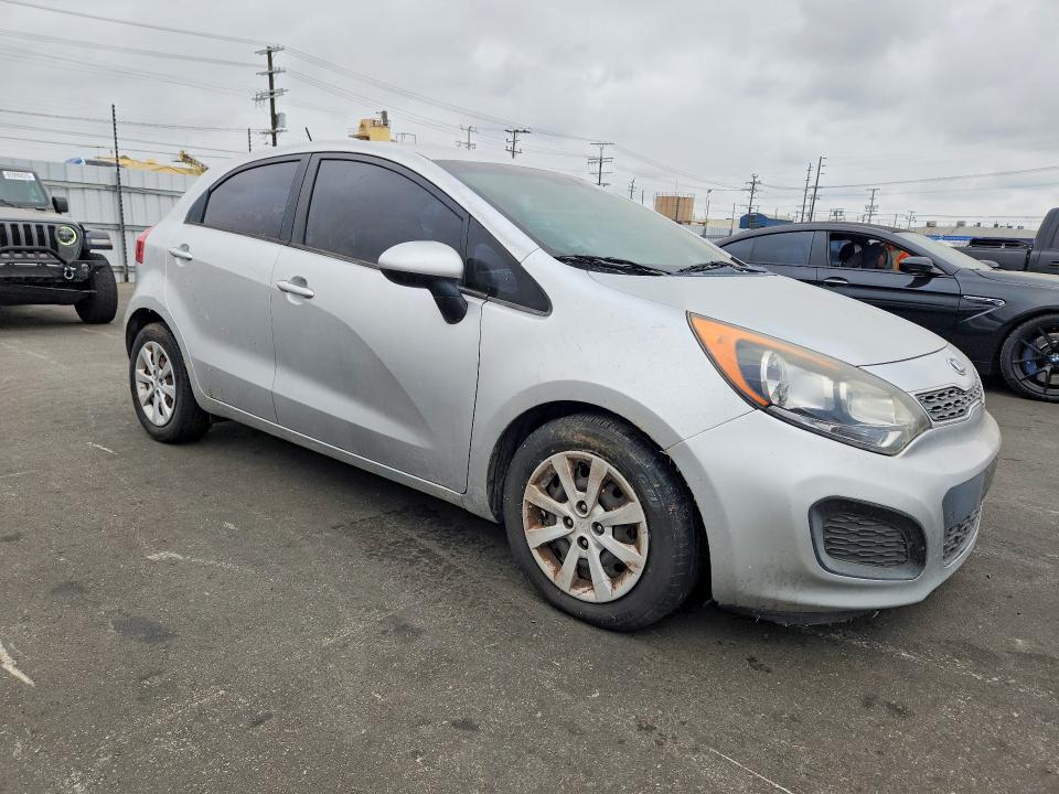 2014 Kia Rio VIN KNADN5A3XE6355414 COPART salvage auction — MECHANICAL, Ca - Dis/Dlr/Exp Only Clean Title, sold $475 on 2026-07-08 (photo 4)