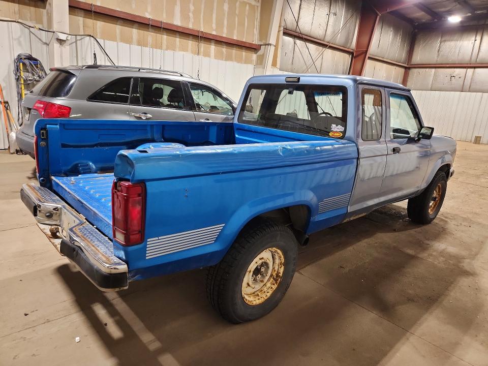 1989 Ford Ranger VIN 1FTCR15T2KPA32065 COPART salvage auction — MINOR DENT/SCRATCHES, Ak - Cert Of Veh Title-Reconstructe, sold $450 on 2026-08-04 (photo 3)