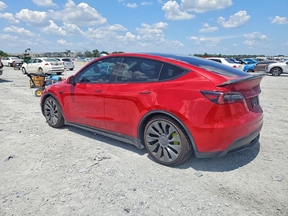 2021 Tesla Model y VIN 5YJYGDEF7MF197484 COPART salvage auction — MINOR DENT/SCRATCHES, Fl - Cert Of Title-Rebuilt, sold $4,600 on 2026-07-28 (photo 2)