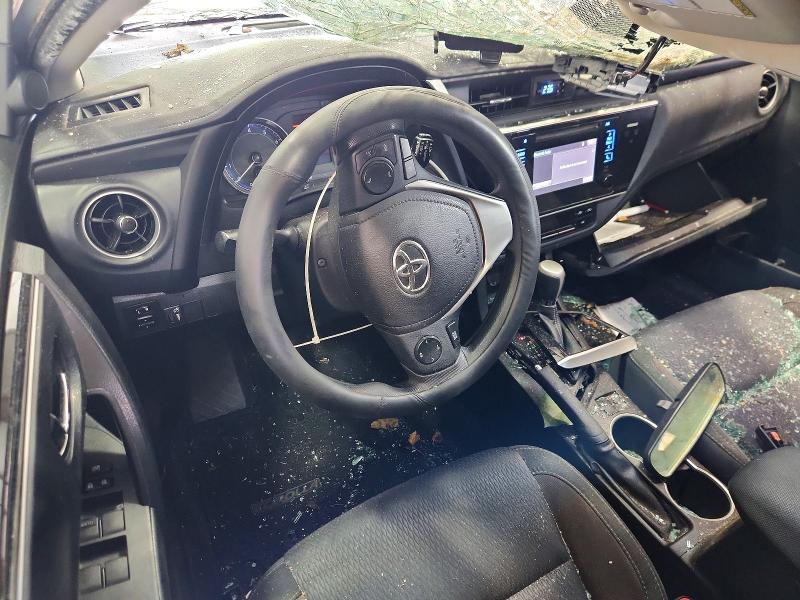 2017 Toyota Corolla VIN 5YFBURHE7HP636711 COPART salvage auction — ALL OVER, VA - CERT OF TITLE - SALVAGE, sold $1,350 on 2026-07-24 (photo 8)