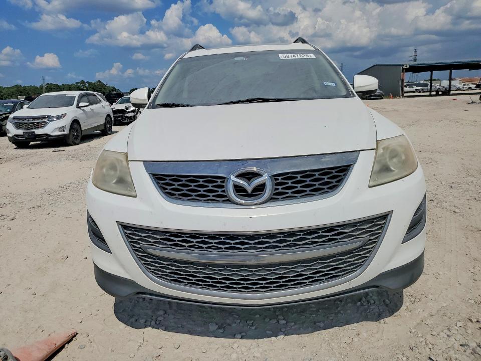 2012 Mazda 2 VIN JM3TB2CA2C0338700 COPART salvage auction — MINOR DENT/SCRATCHES, TX - CERT OF TITLE-REBUILT SALVAGE, sold $1,100 on 2026-07-31 (photo 5)