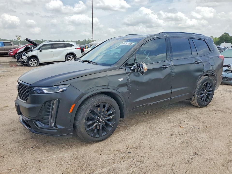 2024 Cadillac Xt6 VIN 1GYKPCRS1RZ734739 COPART salvage auction — SIDE, Tx - Salvage Vehicle Title, sold $10,800 on 2026-07-31 (photo 1)