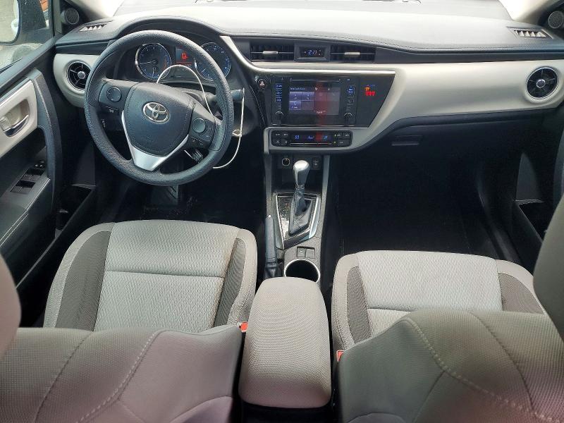 2018 Toyota Corolla VIN 5YFBPRHE2JP833461 COPART salvage auction — SIDE, Fl - Cert Of Title Slvg Rebuildable, sold $2,700 on 2026-07-28 (photo 8)