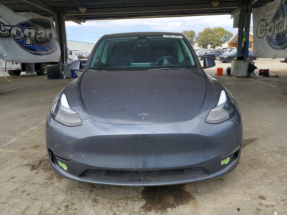 2023 Tesla Model y VIN 7SAYGDEE5PF635305 COPART salvage auction — REAR END, Ca - Salvage Certificate, sold $7,600 on 2026-07-14 (photo 5)