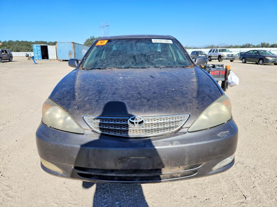 2002 Toyota Camry VIN JTDBF30KX20026098 COPART salvage auction — BIOHAZARD/CHEMICAL, CA - DIS/DLR/EXP ONLY CLEAN TITLE, sold $50 on 2026-07-31 (photo 5)