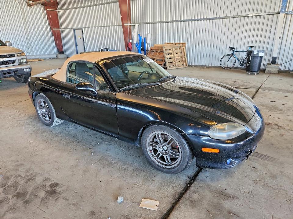 2001 Mazda Mx-5 miata VIN JM1NB353710211945 COPART salvage auction — MINOR DENT/SCRATCHES, Ca - Dis/Dlr/Exp App For Dup Clean, sold $750 on 2026-07-20 (photo 4)