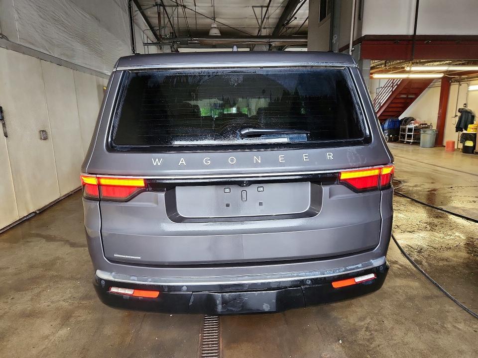 2023 Jeep Grand wagoneer VIN 1C4SJVAT6PS526157 COPART salvage auction — NORMAL WEAR, Ak - Certificate Of Vehicle Title, sold $39,750 on 2026-08-04 (photo 6)