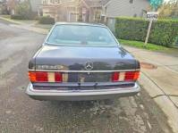 1987 Mercedes-benz 560 VIN WDBCA45D9HA320337 COPART salvage auction — NORMAL WEAR, WA - VEHICLE CERT OF OWNERSHIP-TITL, sold $7,500 on 2026-07-27 (photo 4)