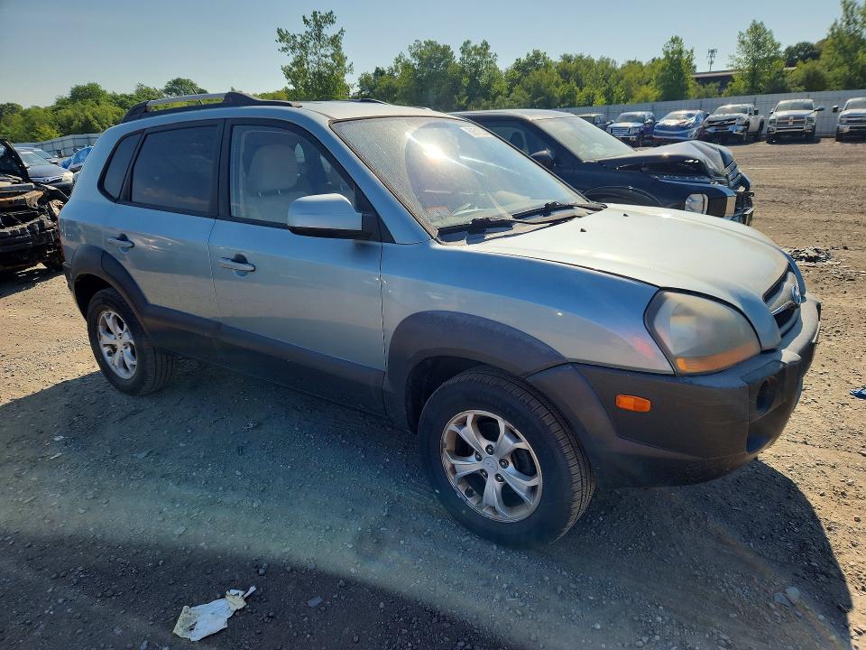 2009 Hyundai Tucson VIN KM8JN12D49U941142 COPART salvage auction — MINOR DENT/SCRATCHES, MA - CERTIFICATE OF TITLE, sold $1,050 on 2026-07-15 (photo 4)