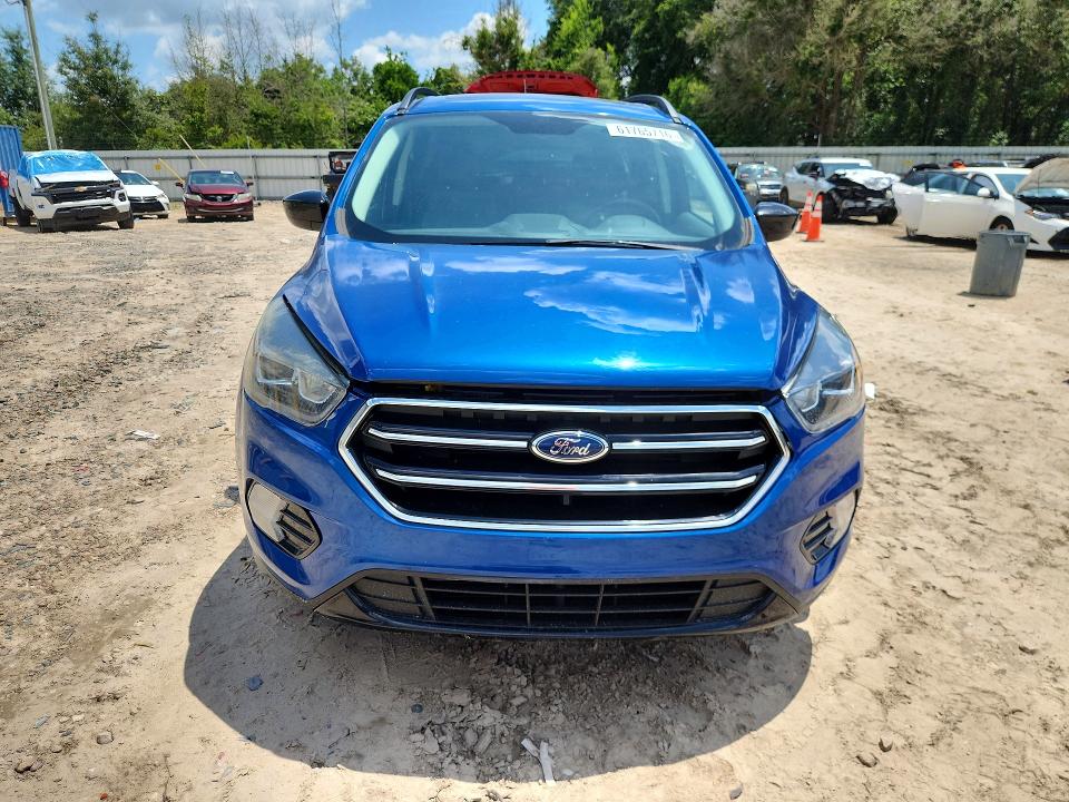 2017 Ford Escape VIN 1FMCU0GD6HUF11304 COPART salvage auction — MINOR DENT/SCRATCHES, Fl - Certificate Of Title, sold $1,050 on 2026-07-31 (photo 5)