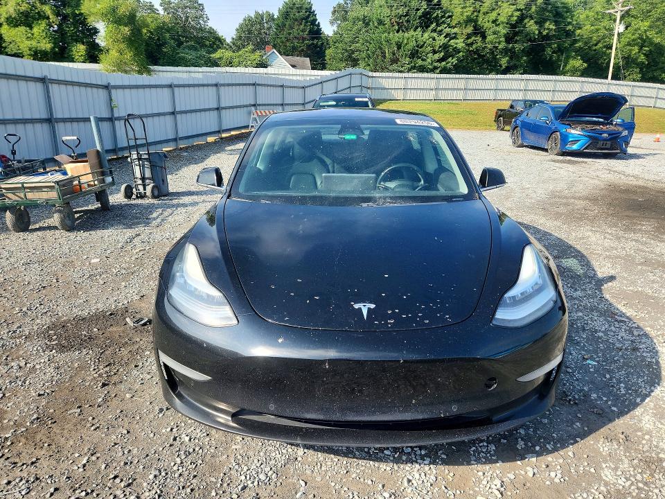 2019 Tesla Model 3 VIN 5YJ3E1EA5KF325138 COPART salvage auction — MINOR DENT/SCRATCHES, Mt - Dealer Only Clean Title (P), sold $5,200 on 2026-09-08 (photo 5)