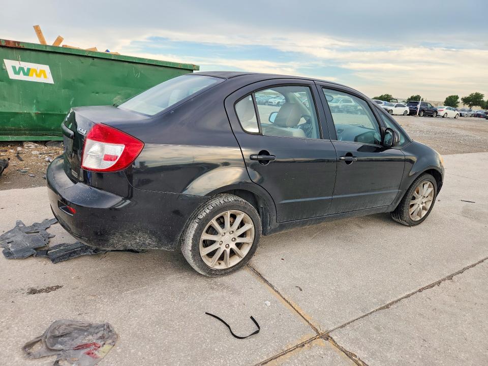 2011 Suzuki Sx4 VIN JS2YC5A21B6303012 COPART salvage auction — MINOR DENT/SCRATCHES, La - Certificate Of Title (P), sold $750 on 2026-07-29 (photo 3)