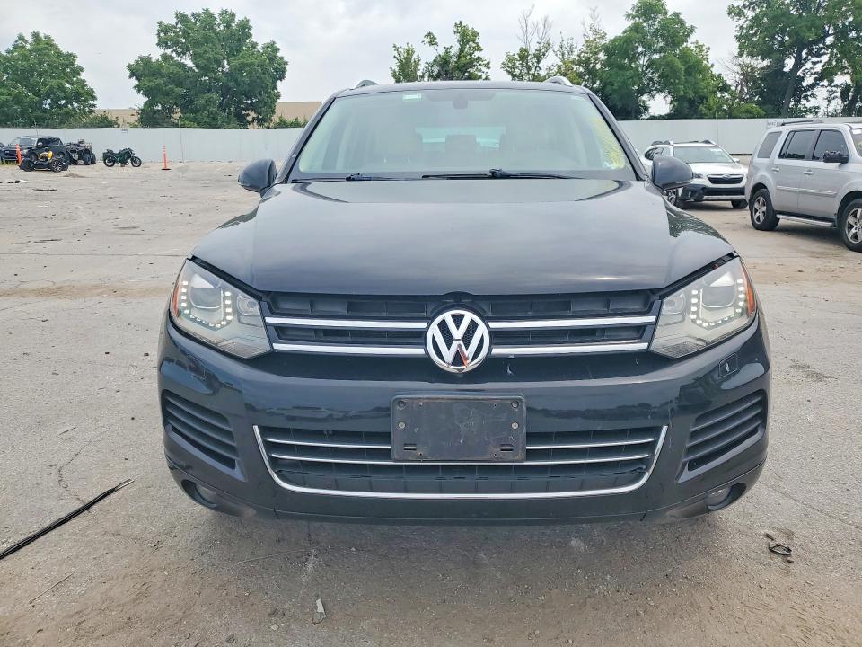 2014 Volkswagen VIN WVGEF9BP8ED014727 COPART salvage auction — WATER/FLOOD, Mo - Salvage Certificate Of Title, sold $175 on 2026-07-28 (photo 5)