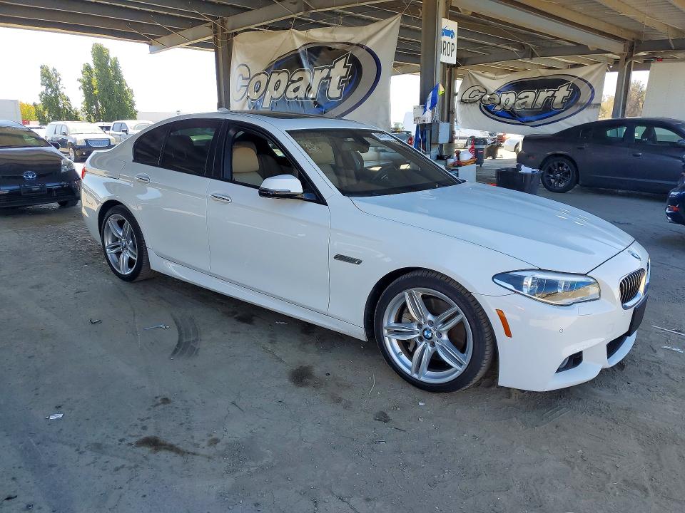 2014 BMW VIN WBAKN9C50ED681523 COPART salvage auction — MINOR DENT/SCRATCHES, Ca - Dis/Dlr/Exp Only Clean Title (P), sold $750 on 2026-07-23 (photo 4)