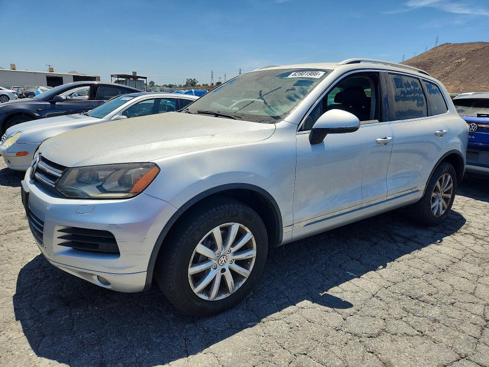 2012 Volkswagen Touareg VIN WVGFK9BPXCD004486 COPART salvage auction — SIDE, CA - DIS/DLR/EXP ONLY CLEAN TITLE, sold $1,850 on 2026-08-10 (photo 1)