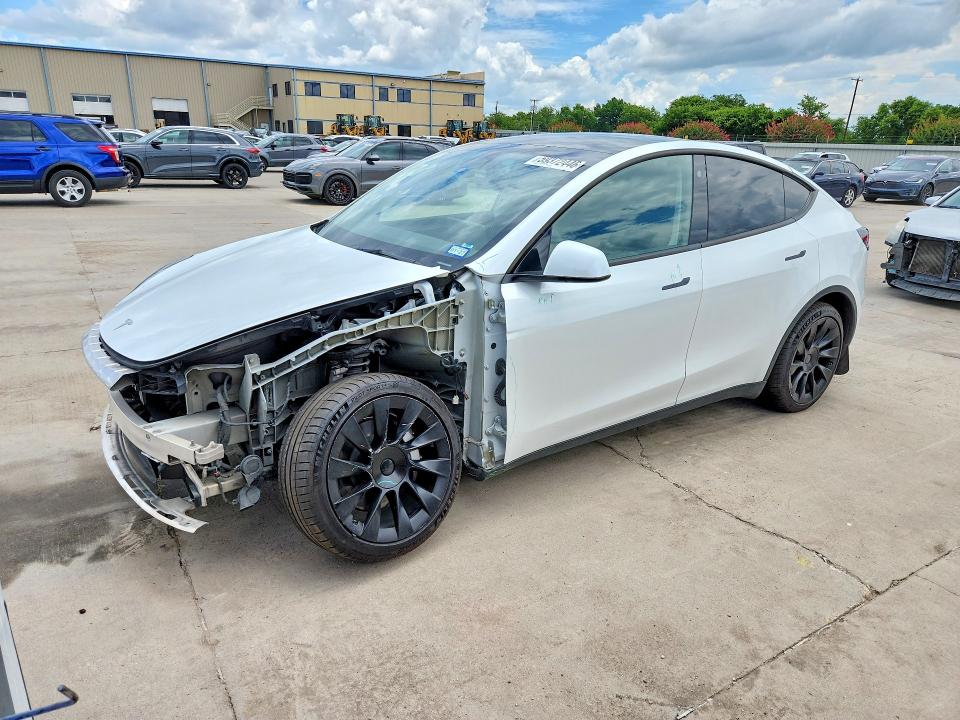 2023 Tesla Model y VIN 7SAYGDEE3PA069934 — COPART salvage auction photo
