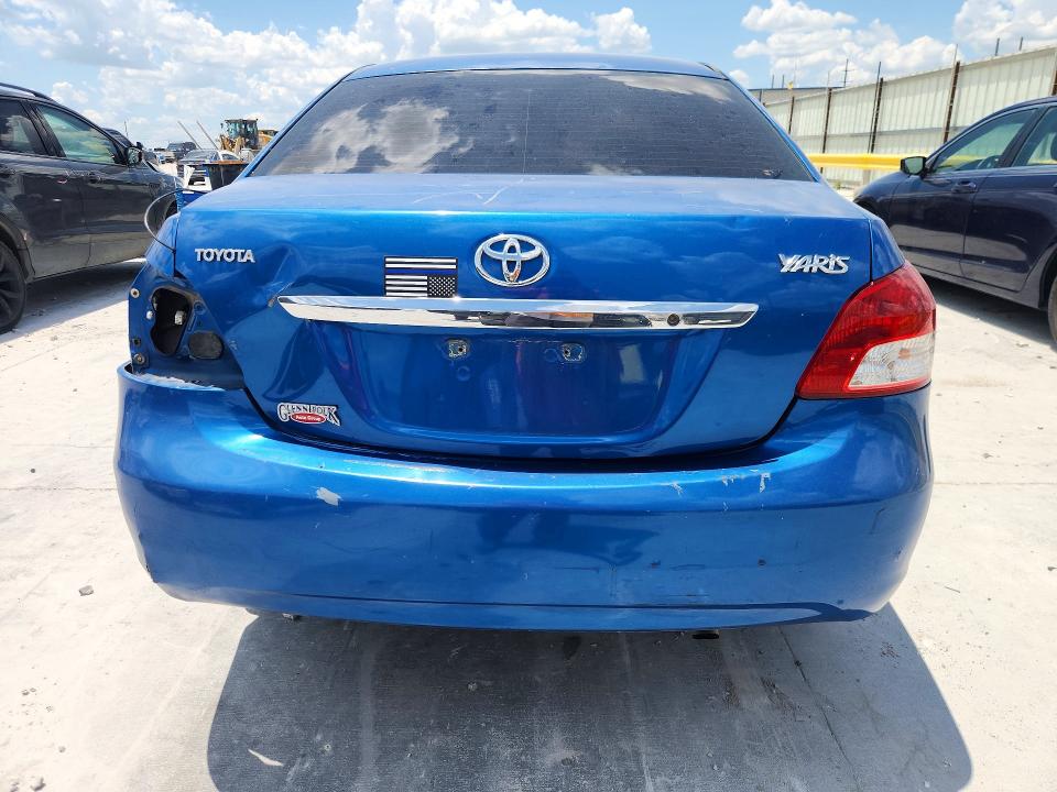 2010 Toyota Yaris VIN JTDBT4K38A1397225 COPART salvage auction — FRONT END, TX - SALVAGE VEHICLE TITLE, sold $175 on 2026-07-21 (photo 6)
