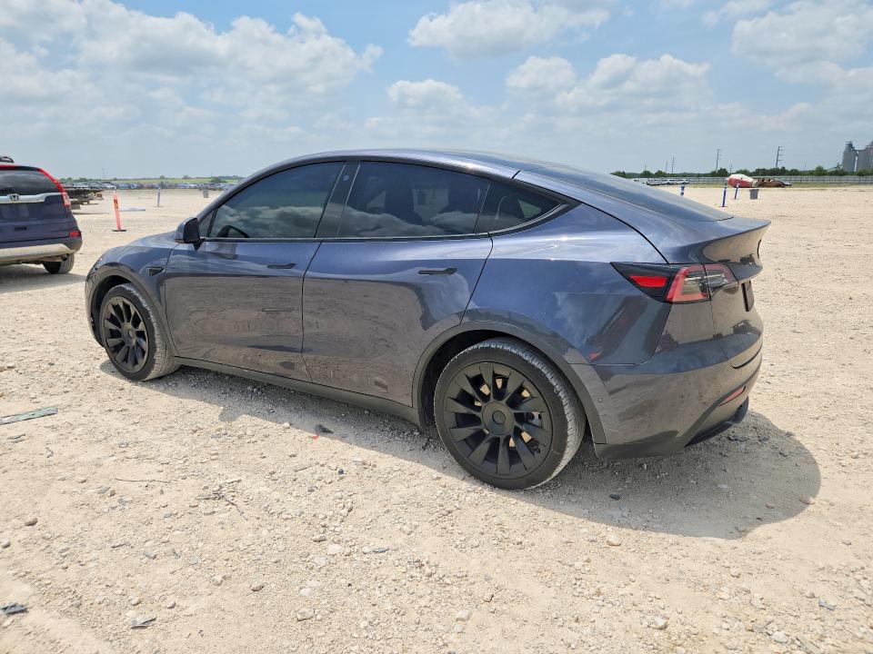 2021 Tesla Model y VIN 5YJYGDEE9MF149038 COPART salvage auction — NORMAL WEAR, TX - CERT OF TITLE-REBUILT SALVAGE, sold $9,900 on 2026-08-03 (photo 2)