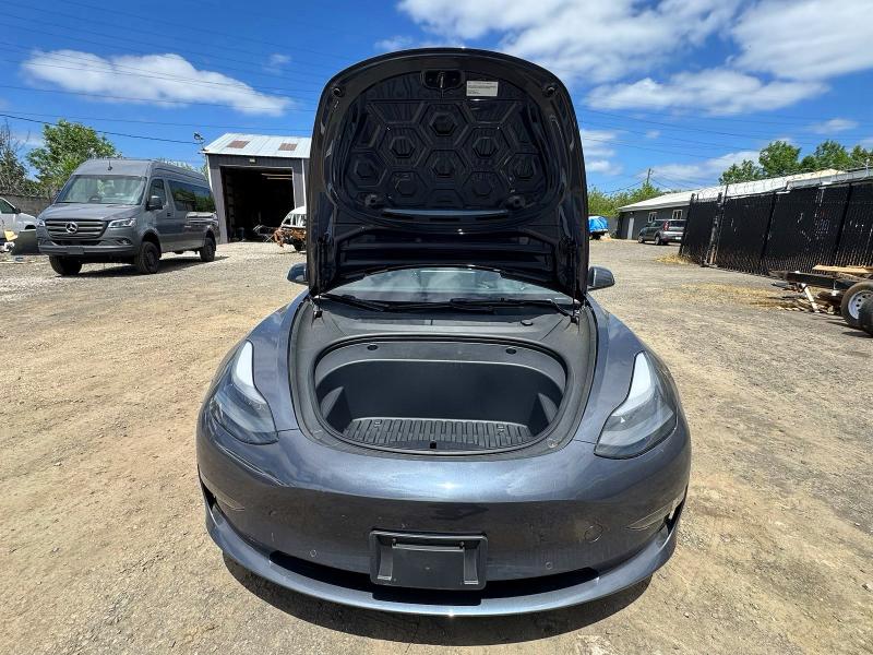 2022 Tesla Model 3 VIN 5YJ3E1EA5NF185418 COPART salvage auction — NORMAL WEAR, OR - CERTIFICATE OF TITLE (P), sold $22,300 on 2026-07-28 (photo 7)