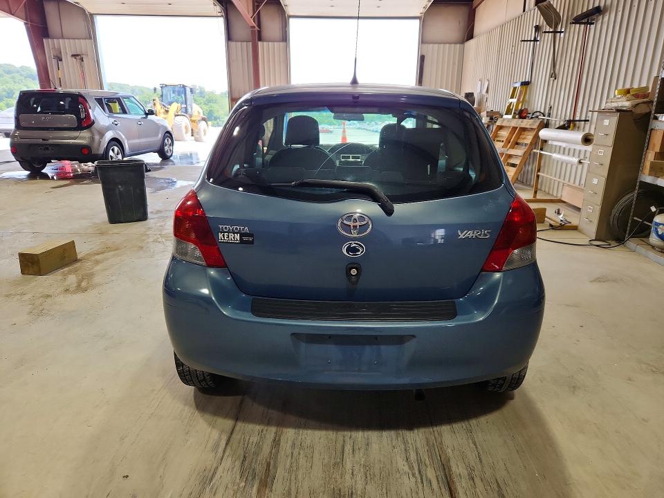 2011 Toyota Yaris VIN JTDJT4K32B5336281 COPART salvage auction — MINOR DENT/SCRATCHES, VA - CERTIFICATE OF TITLE, sold $1,550 on 2026-07-10 (photo 6)