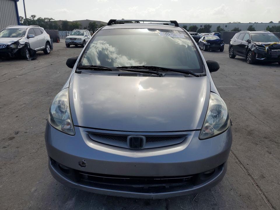 2007 Honda Fit VIN JHMGD38467S026112 COPART salvage auction — REAR END, Fl - Cert Of Title Slvg Rebuildable, sold $375 on 2026-07-28 (photo 5)