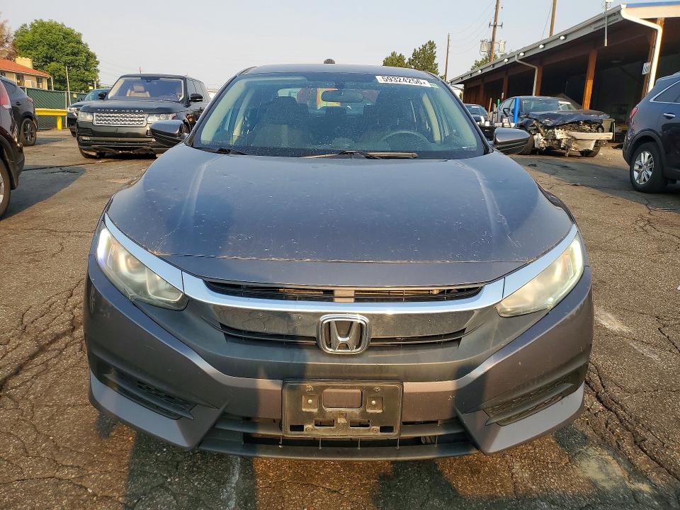 2016 Honda VIN 19XFC2F50GE011288 COPART salvage auction — SIDE, Co - Public - Salvage Title, sold $3,150 on 2026-07-09 (photo 5)