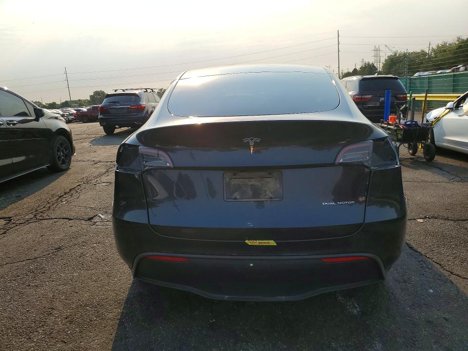 2024 Tesla Model y VIN 7SAYGDEEXRF195603 COPART salvage auction — ALL OVER, Co - Salvage Title, sold $8,500 on 2026-09-10 (photo 6)