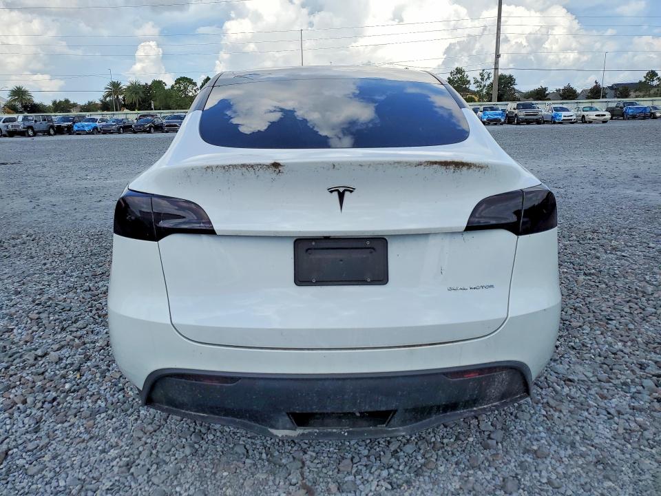 2023 Tesla Model y VIN 7SAYGDEE4PF608631 COPART salvage auction — SIDE, FL - CERT OF TITLE SLVG REBUILDABLE, sold $10,700 on 2026-07-31 (photo 6)