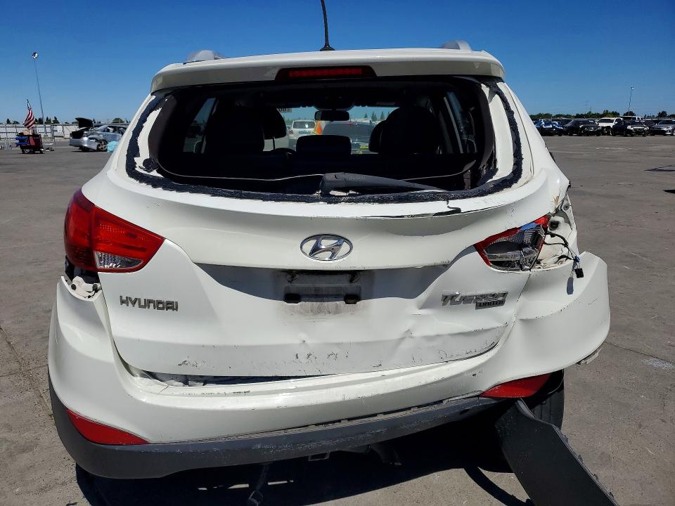 2010 Hyundai Tucson VIN KM8JU3AC5AU085796 COPART salvage auction — REAR END, Ca - Dis/Dlr/Exp Only Clean Title, sold $550 on 2026-07-27 (photo 6)