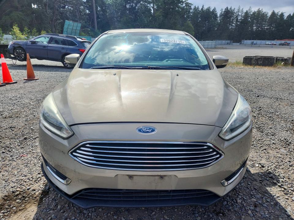 2015 Ford Focus VIN 1FADP3J29FL363523 COPART salvage auction — FRONT END, Wa - Vehicle Cert Of Ownership-Titl (P), sold $2,750 on 2026-07-10 (photo 5)