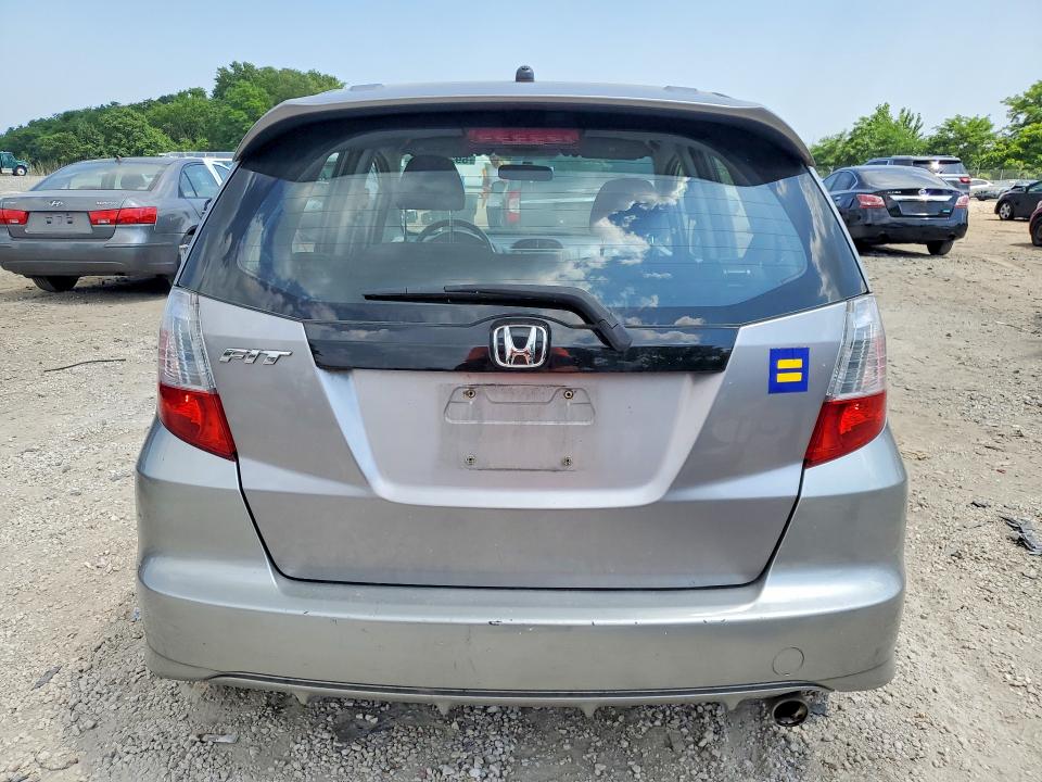 2010 Honda Fit VIN JHMGE8H62AS024554 COPART salvage auction — SIDE, Md - Cert Of Salvage > 75% Damage, sold $875 on 2026-07-28 (photo 6)