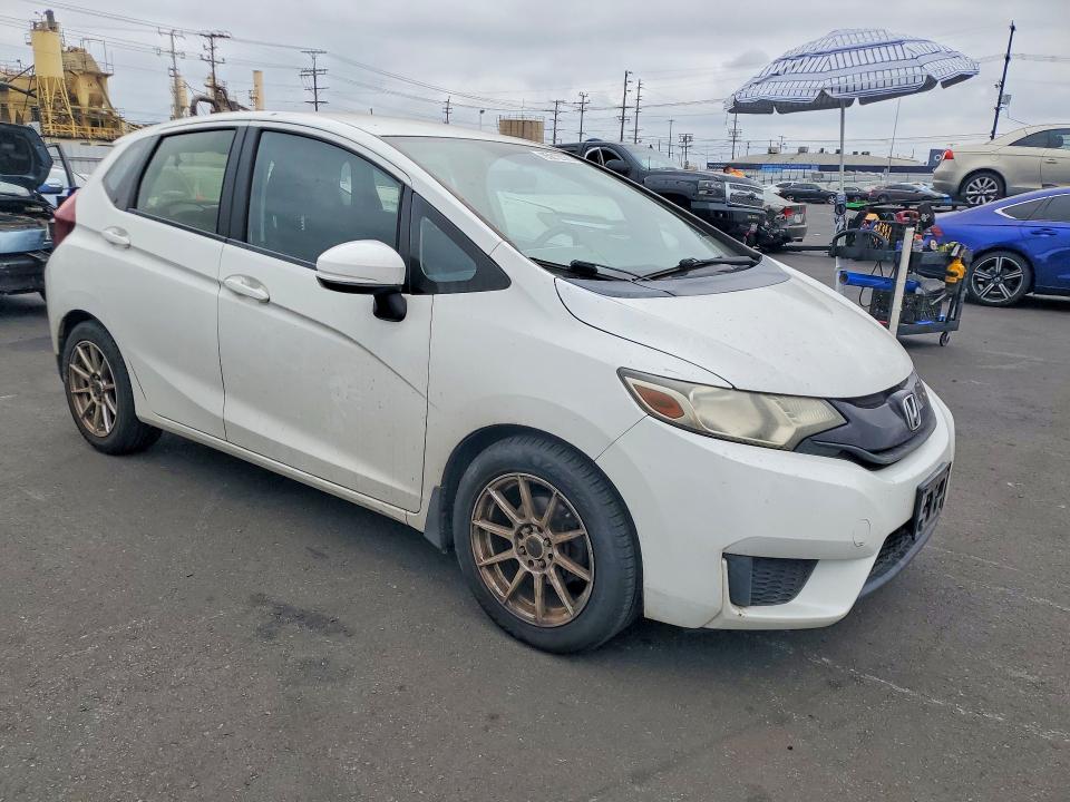 2017 Honda Fit VIN JHMGK5H59HS019781 COPART salvage auction — MINOR DENT/SCRATCHES, Ca - Dis/Dlr/Exp Only Clean Title, sold $1,400 on 2026-07-08 (photo 4)