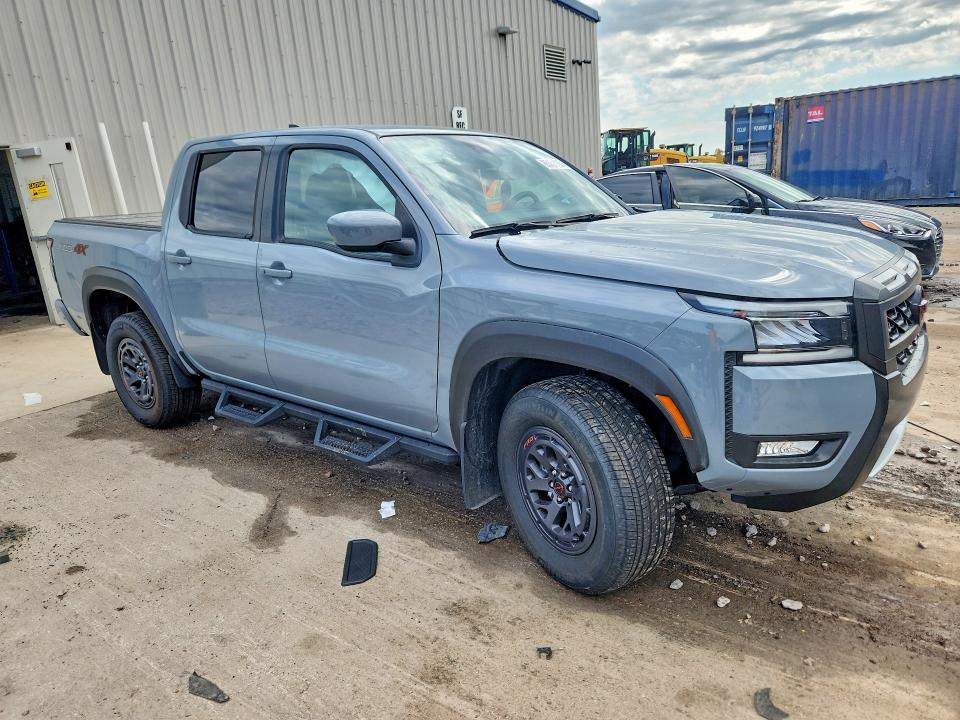 2025 Nissan Navara (frontier) VIN 1N6ED1EK1SN605965 COPART salvage auction — SIDE, Wi - Cert Of Title-Salvage Vehicle, sold $11,400 on 2026-08-17 (photo 4)