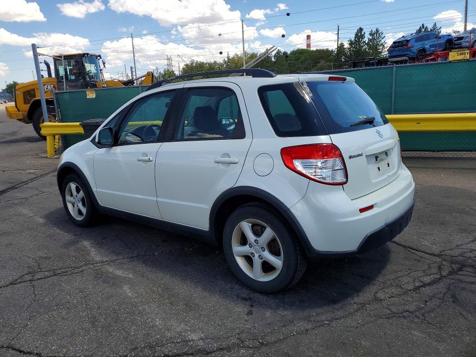 2009 Suzuki Sx4 VIN JS2YA413096201610 COPART salvage auction — HAIL, CO - DIS/DLR/EXP ONLY CLEAN TITLE, sold $825 on 2026-09-10 (photo 2)