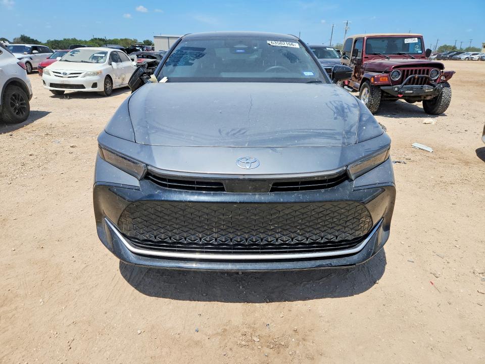 2026 Toyota Crown signia VIN JTDAAAAF9T3040350 COPART salvage auction — SIDE, Tx - Salvage Vehicle Title, sold $16,200 on 2026-08-27 (photo 5)