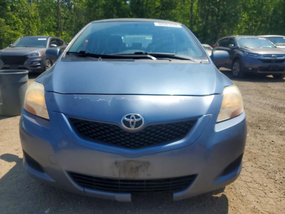 2009 Toyota Yaris VIN JTDBT923491310123 COPART salvage auction — SIDE, On - Permit Salvage, sold $350 on 2026-07-28 (photo 5)